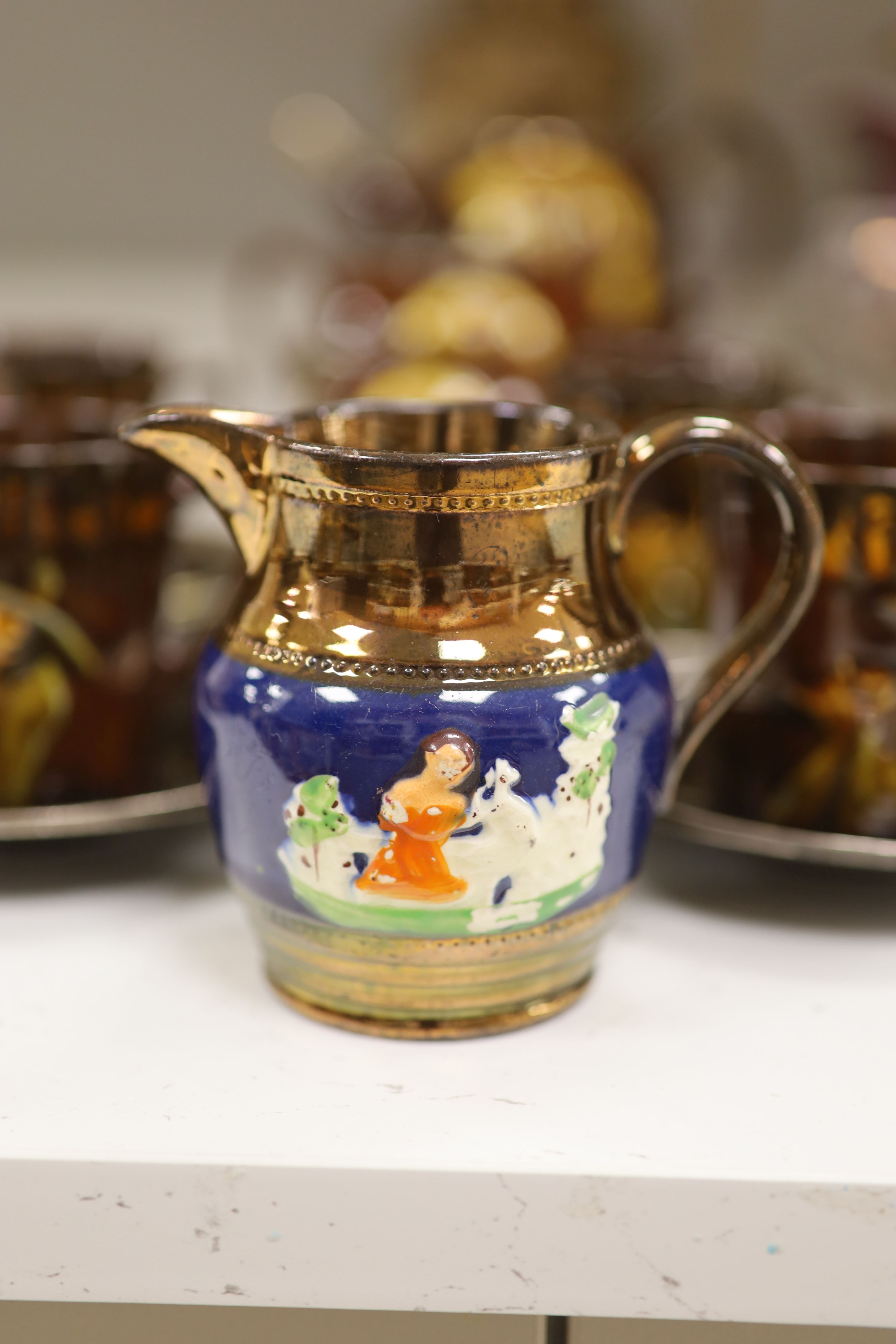 A Royal Doulton silver mounted Hearts Content tea service, and a Doulton Japanese inspired silver mounted jug, assorted lustre jugs